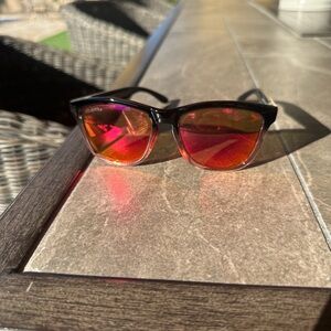 Women's hyper color Black and white or pink frame sun glasses with Red lenses